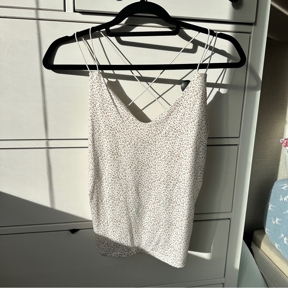 White mini cheetah print cross strap top